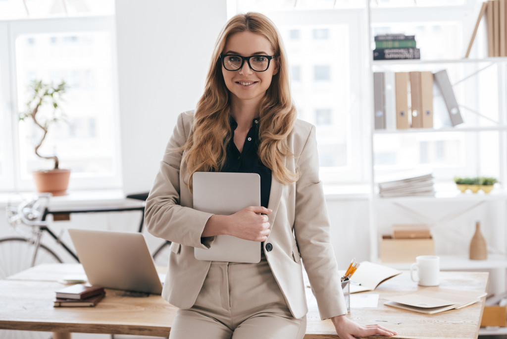 well dressed woman in her office