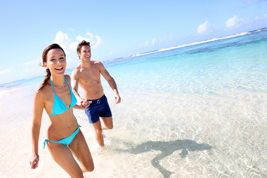 couple at the beach having fun